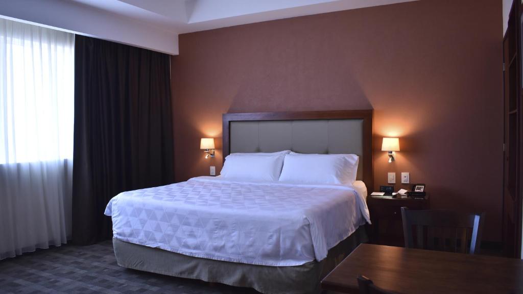 Holiday Inn & Suites Plaza Mayor, an IHG Hotel Holiday Inn & Suites Plaza Mayor, an IHG Hotel