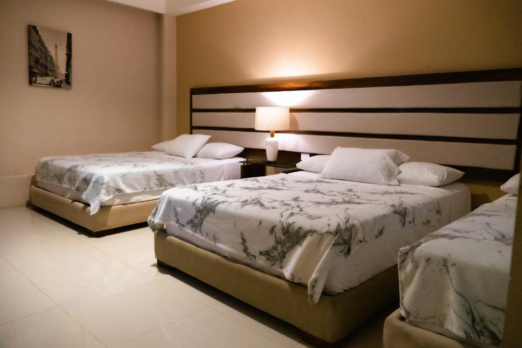 Infinity Suites habitación triple Infinity Suites habitación triple