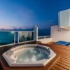 Rooftop Private Jacuzzi in beach front penthouse